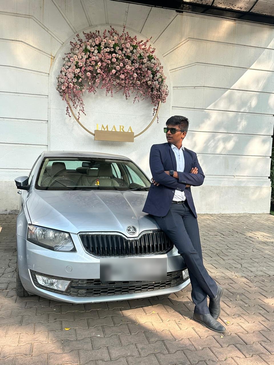 Sujal Patil, founder of Smart Mind Trading's, in a navy suit